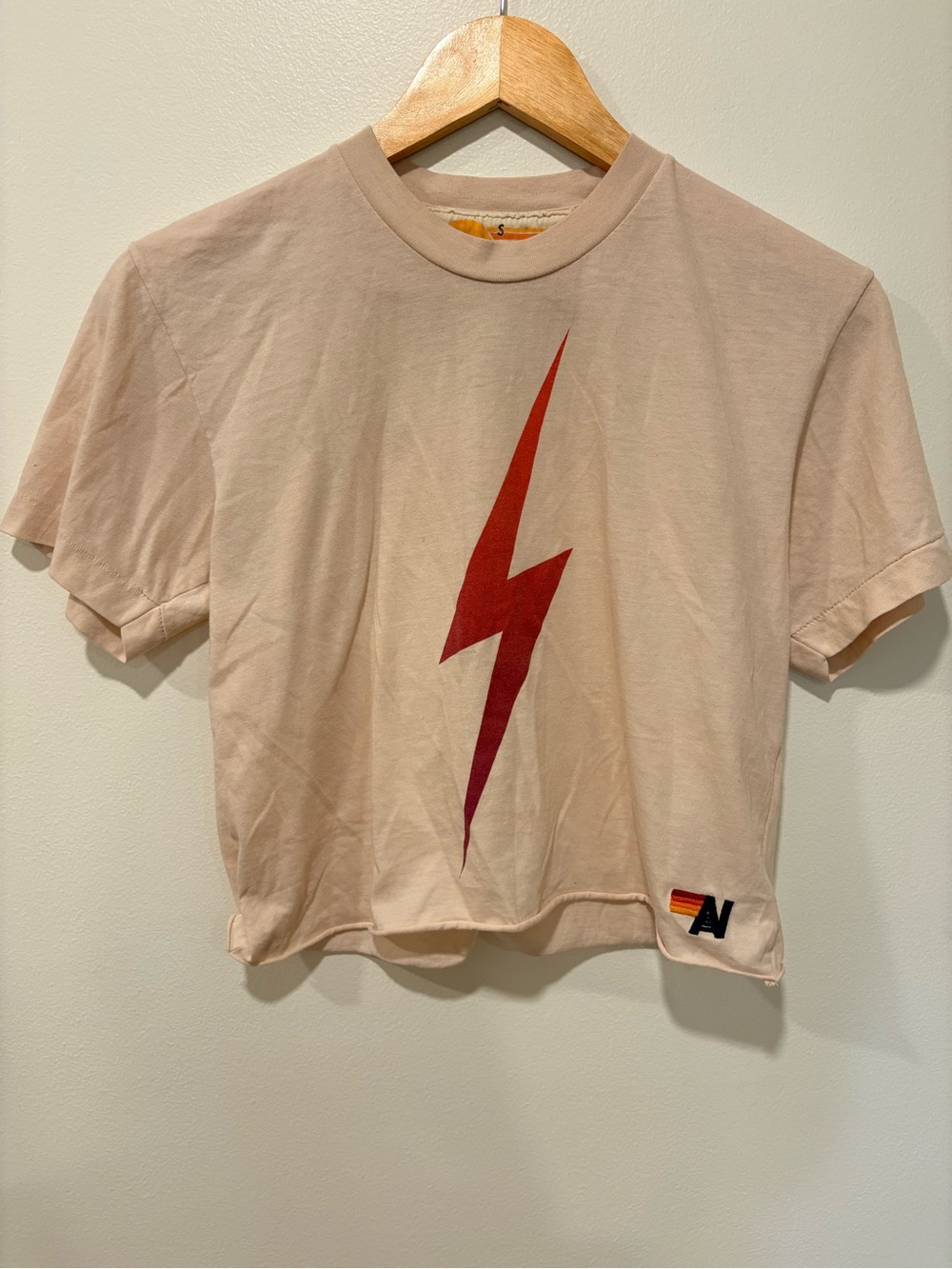 Aviator Nation Beige Tee with Red Lightning Bolt